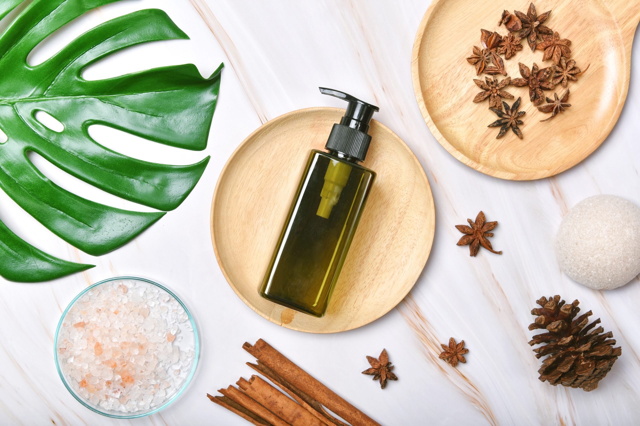 natural skincare beauty product, cosmetic bottle containers packaging with green nature leaves, blank label for organic spa branding mock up,herbal healthy skin care.